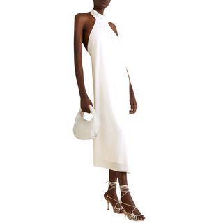 model wearing HALSTON Kali draped jersey halterneck midi dress