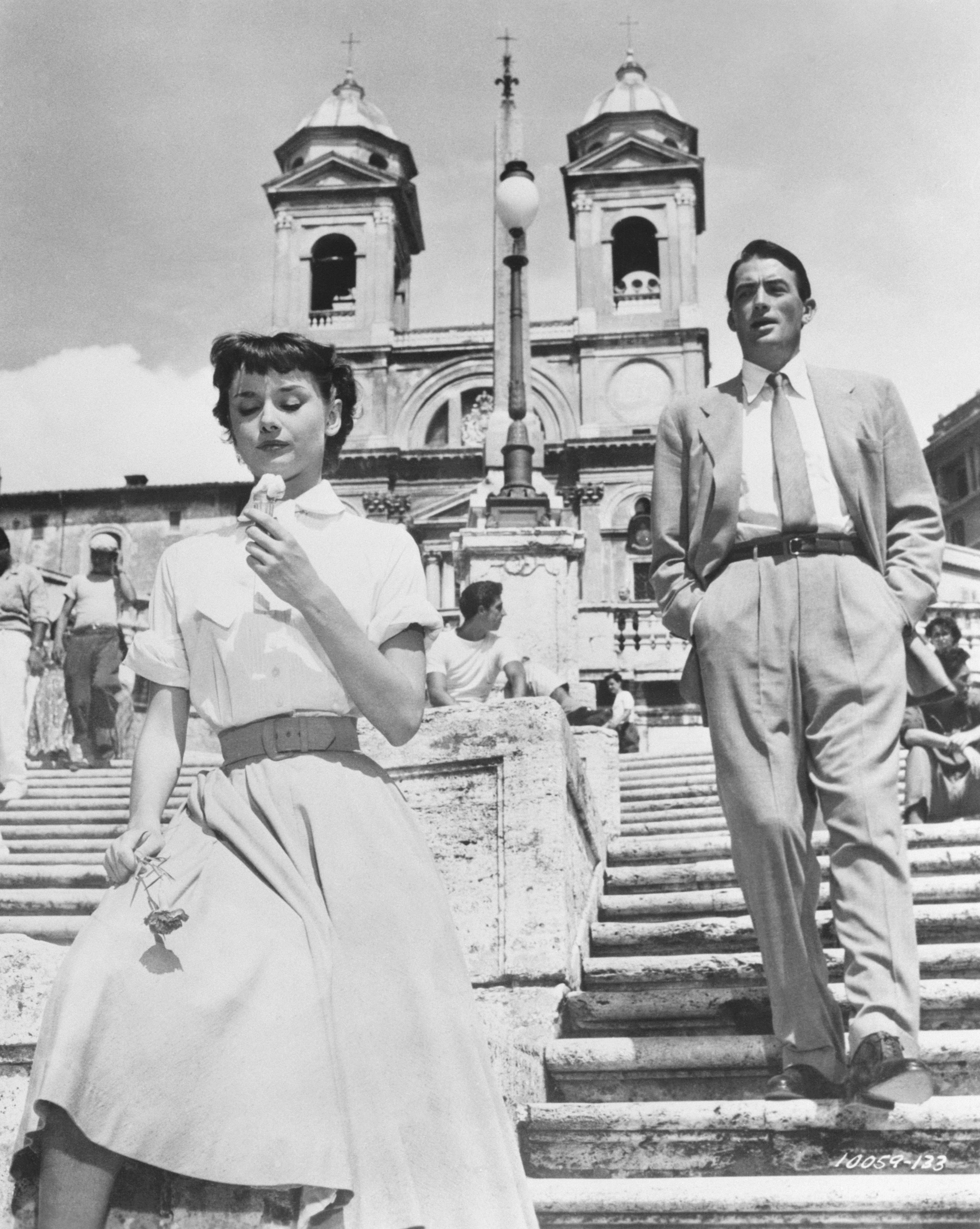 Audrey Hepburn as Princess Ann and Gregory Peck as Joe Bradley on the Spanish Steps in &#039;Roman Holiday&#039;.
