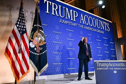 US President Donald Trump gestures at the conclusion of his remarks on 'Trump Accounts' at the Andrew W. Mellon Auditorium in Washington, DC, on January 28, 2026.
