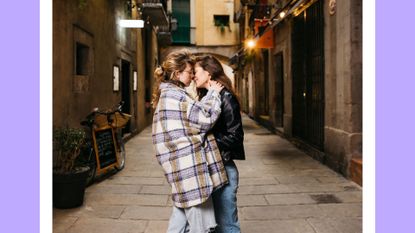 a couple kissing on european-looking streets