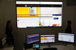 A security control center display using AMX by Harman technology.