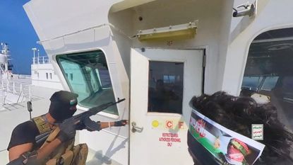 Houthi fighters take over the Galaxy Leader ship in the Red Sea off Hudaydah in November