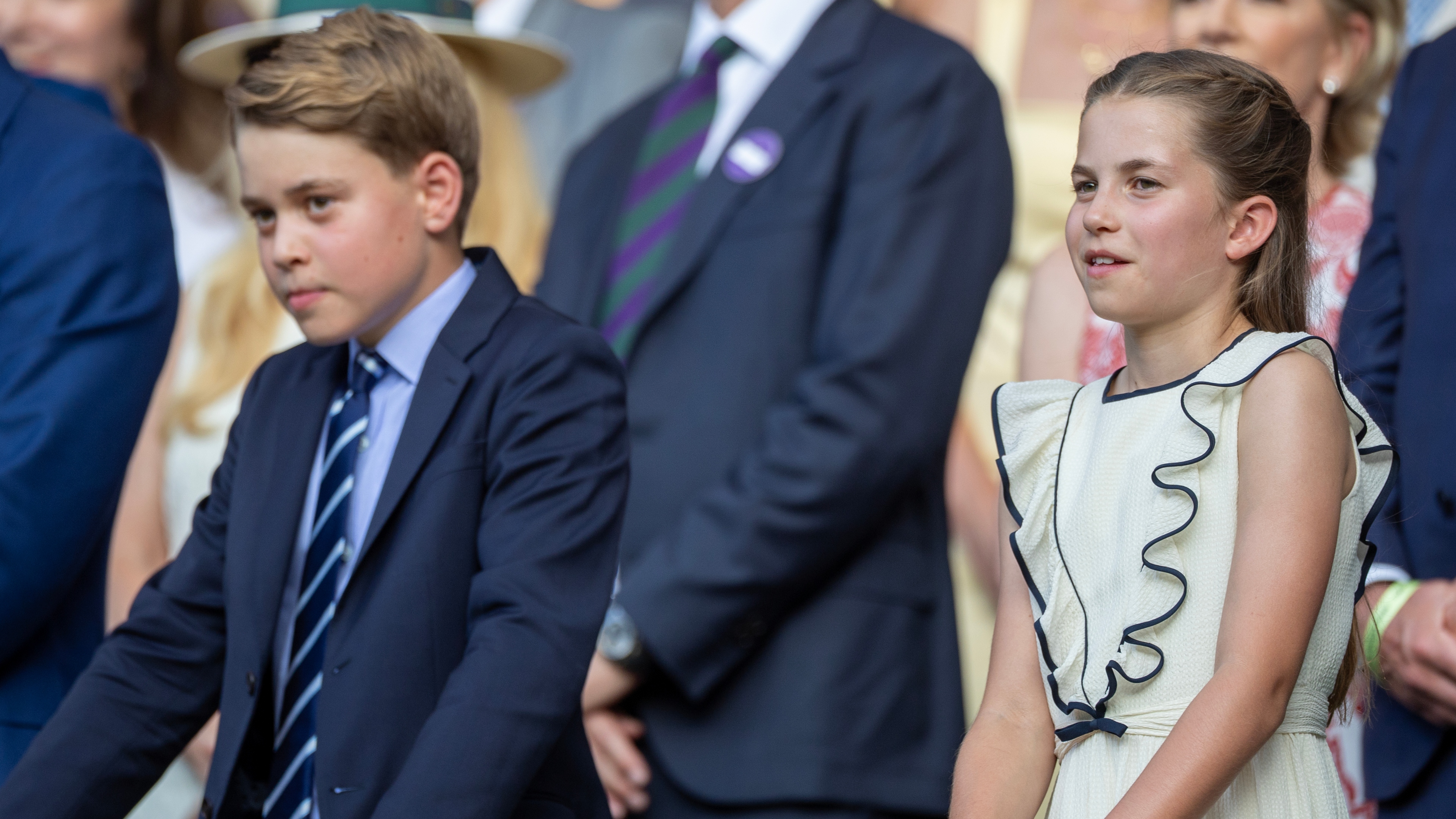 Prince George and Princess Charlotte watch the presentation ceremony of the Gentlemen's Singles Final on Centre Court at Wimbledon 2025