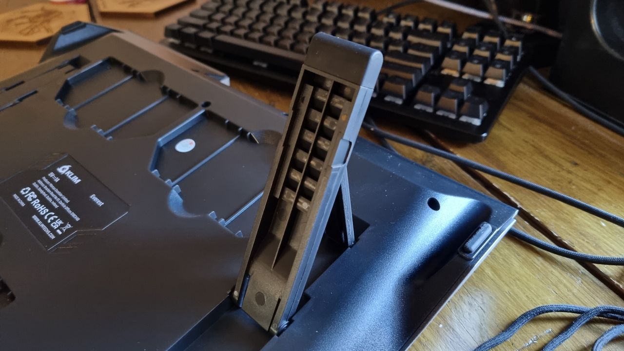 Assorted images of the Klim Everest laptop cooler, and everything included inside the box