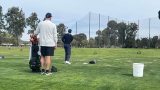 Tiger Woods hitting a flop shot on the range at Riviera ahead of the 2023 Genesis Invitational
