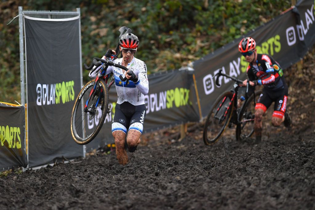 NIEL BELGIUM NOVEMBER 11 Lars Van Der Haar of The Netherlands and Team Baloise Trek Lions competes in a muddy sector during the 30th Superprestige Niel Jaarmarktcross 2021 Mens Elite SPNiel Superprestige2022 on November 11 2021 in Niel Belgium Photo by Luc ClaessenGetty Images