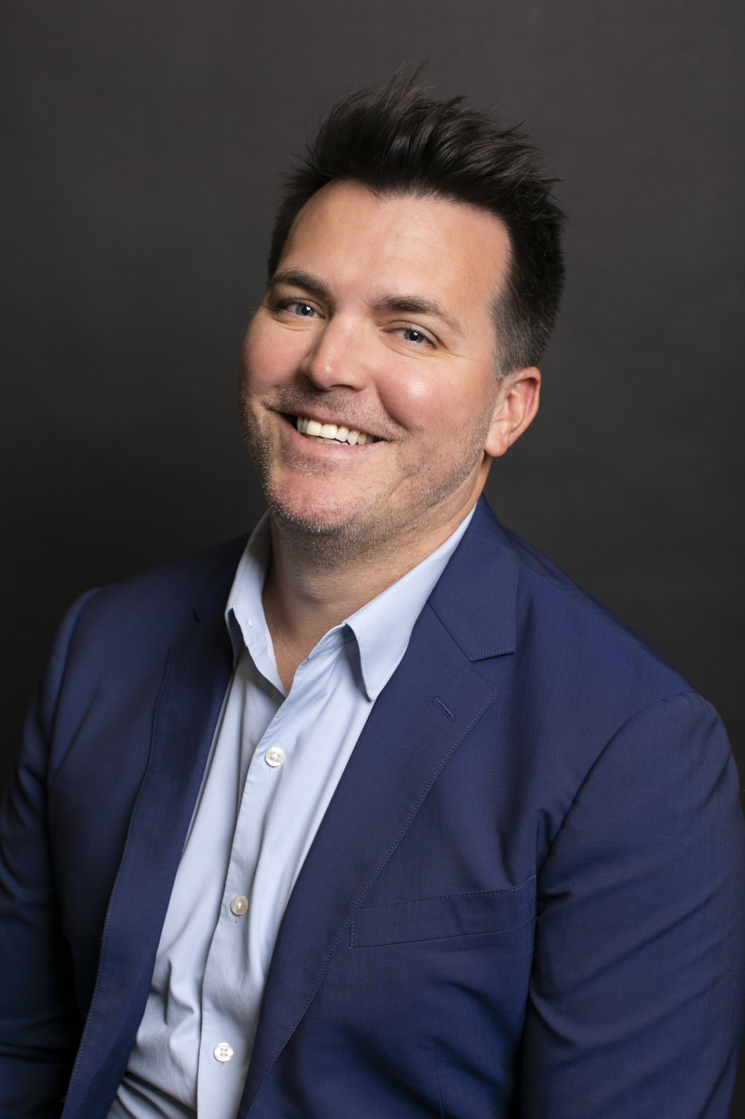 Smiling headshots of Kasey Kaumans and Robert Luckey.