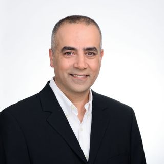 Smiling headshot of Eliran Toren, CEO, MSolutions.