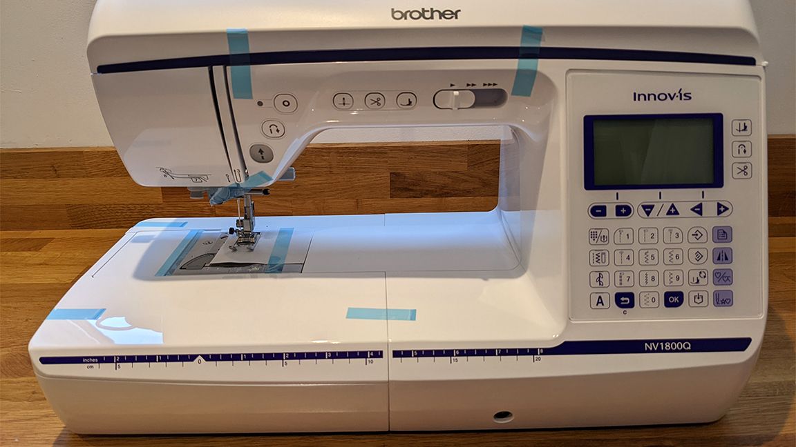 Brother Innovis NV1800Q review, a photo of a sewing machine on a wooden table