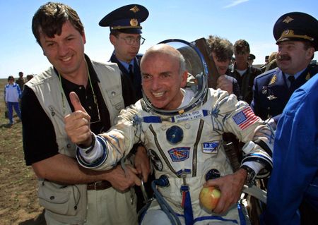 Dennis Tito lands following his trip to the International Space Station in 2001. 