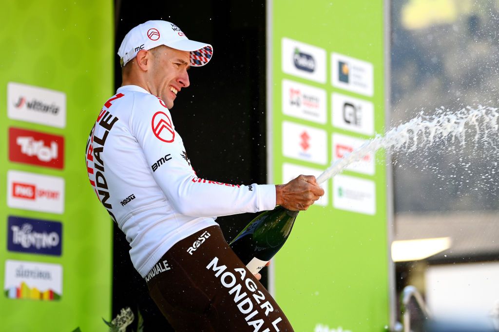 SAN MARTINO DI CASTROZZA ITALY APRIL 18 Geoffrey Bouchard of France and AG2R Citroen Team celebrates winning the stage one on the podium ceremony after the 45th Tour of the Alps 2022 Stage 1 a 1609km stage from Cles to PrimieroS Martino di Castrozza 708m TouroftheAlps on April 18 2022 in San Martino di Castrozza Italy Photo by Tim de WaeleGetty Images