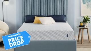 The Serta 10" cooling gel memory foam mattress on a bed frame in a nicely-designed room