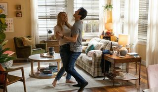 Jessica Rothe and Harry Shum Jr in All My Life, dancing