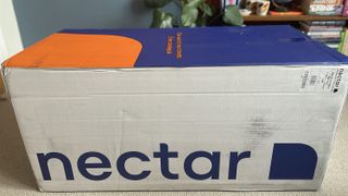 The Nectar Memory Foam Mattress still in its cardboard box during the set up part of our review