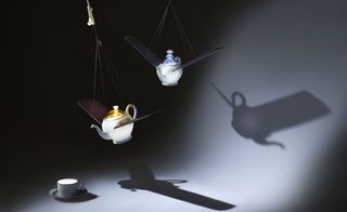 An image of Porcelain tea pots and cups are refashioned into light fittings