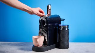 the nespreso citiz & milk on the blue tom's guide background