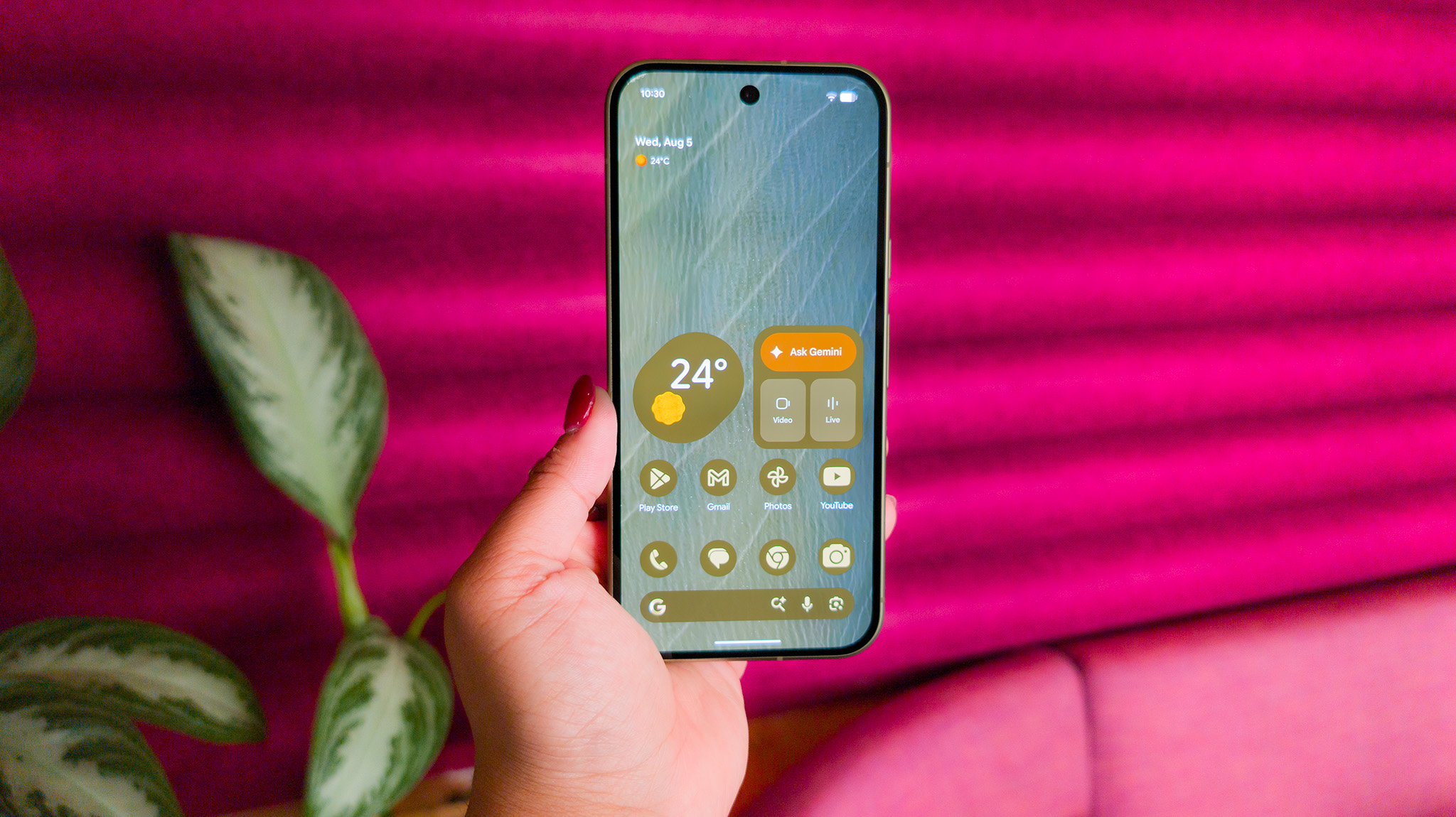 The colorful themed home screen of the Google Pixel 11
