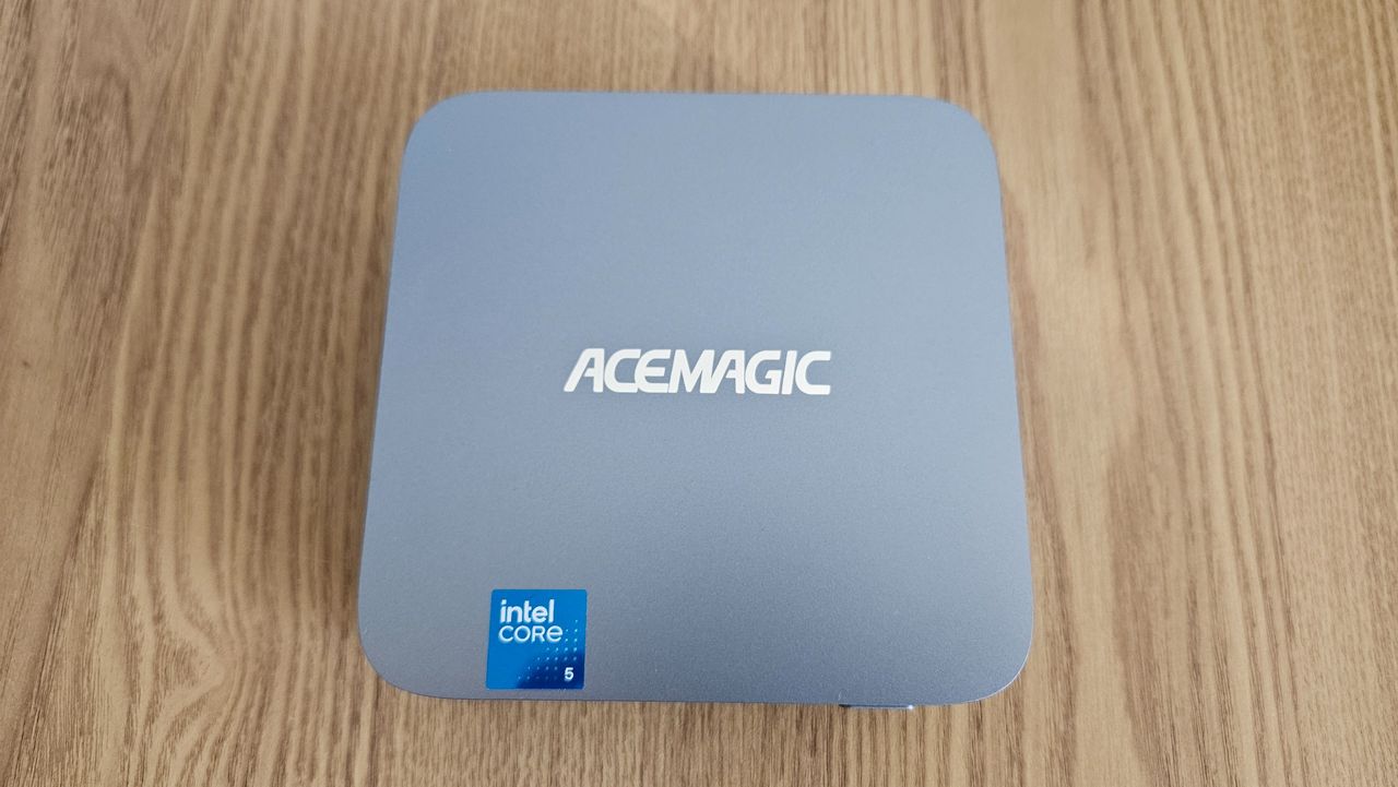The Acemagic Kron Mini K5 PC on a desk