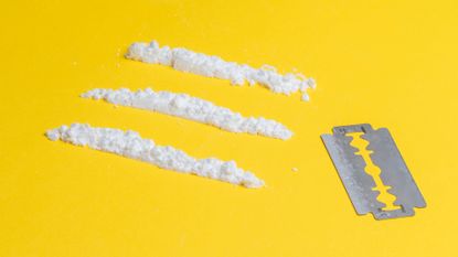 Three lines of cocaine and a blade