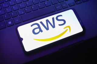 The Amazon Web Services (AWS) logo appears on a smartphone screen