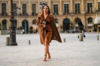 woman in brown velvet dress