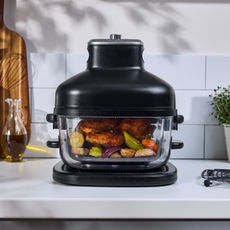 Lidl glass air fryer roasting a chicken.