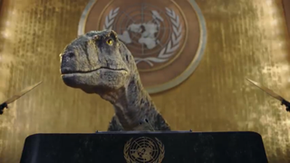 The CGI talking dinosaur gives a speech at the UN General Assembly in the new video.
