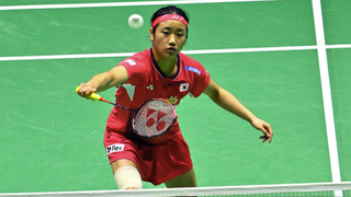 An Se-young of Korea plays a backhand ahead of the badminton live stream at Olympics 2024.