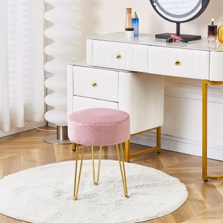 A light pink stool