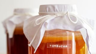 Kombucha in glass with top and label