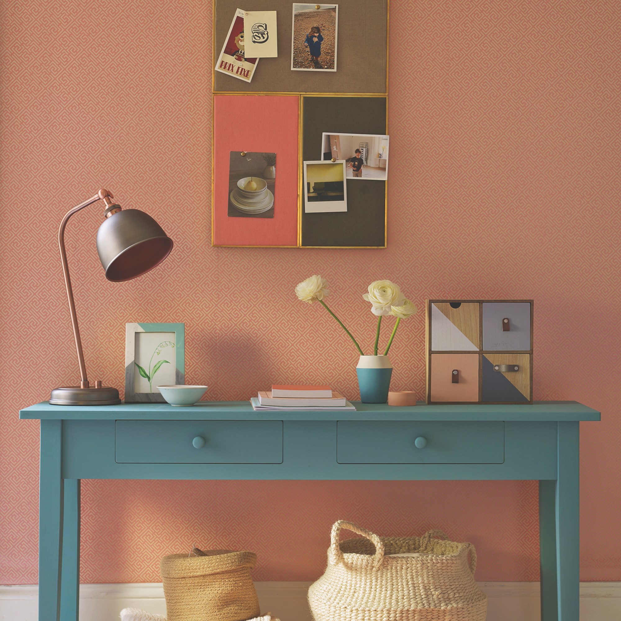 hallway wall decor ideas, coral hallway with bright blue console table, baskets, table lamp, vases, baskets, pinboard on wall