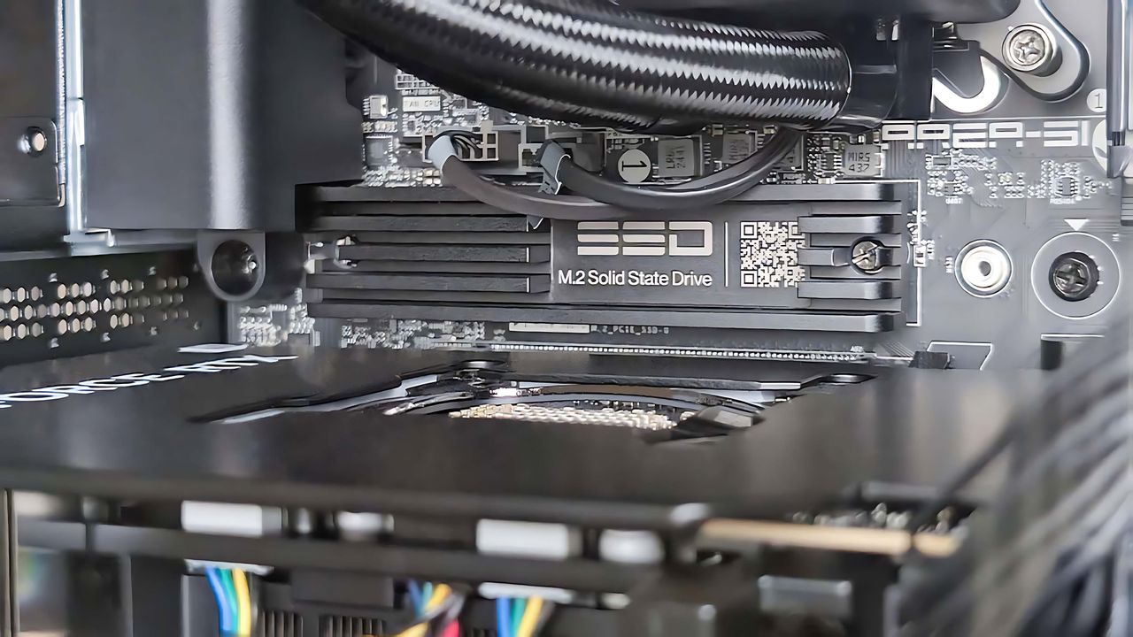 A closeup of the smaller SSD inside the Alienware Area-51 Gaming Desktop (2025).