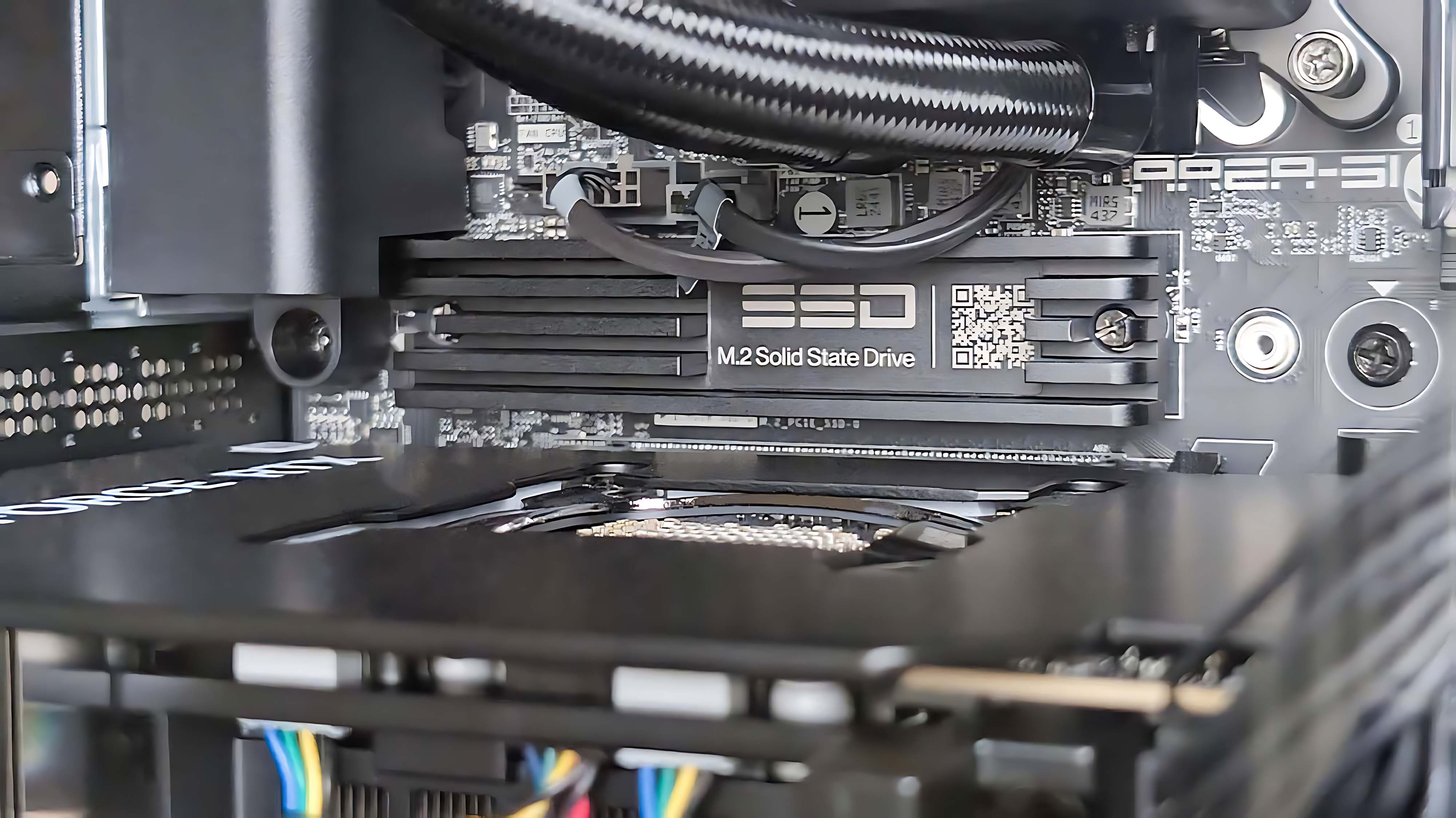 A closeup of the smaller SSD inside the Alienware Area-51 Gaming Desktop (2025).