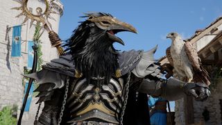 Kliff has a bird perched on his forearm.