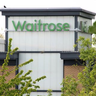 A Waitrose store sign seen at the store