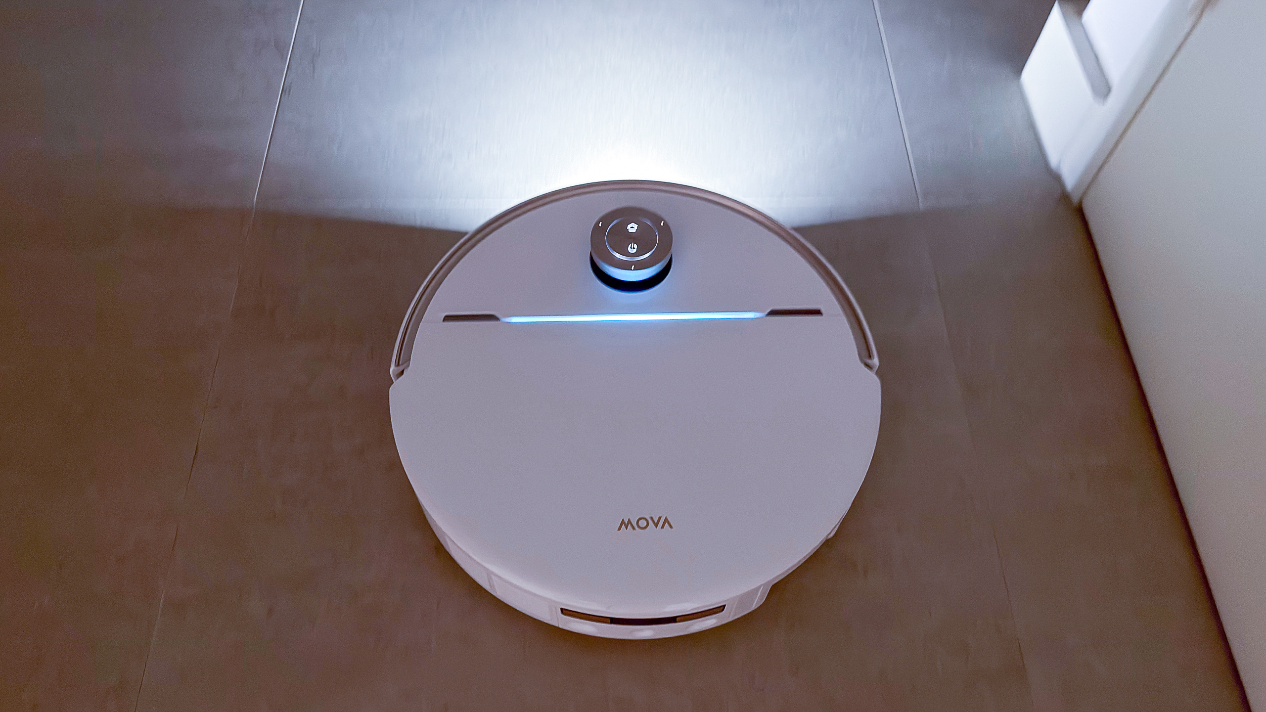 Mova V70 Ultra Complete robot with its light on