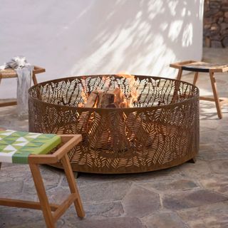 An Anthropologie Fronds Fire Pit 