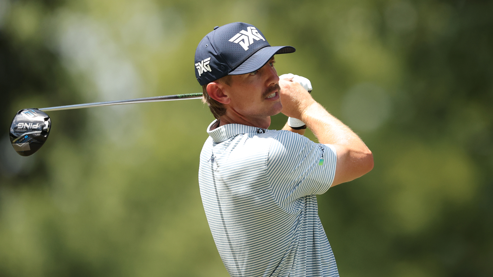 Jake Knapp hits a driver off the tee