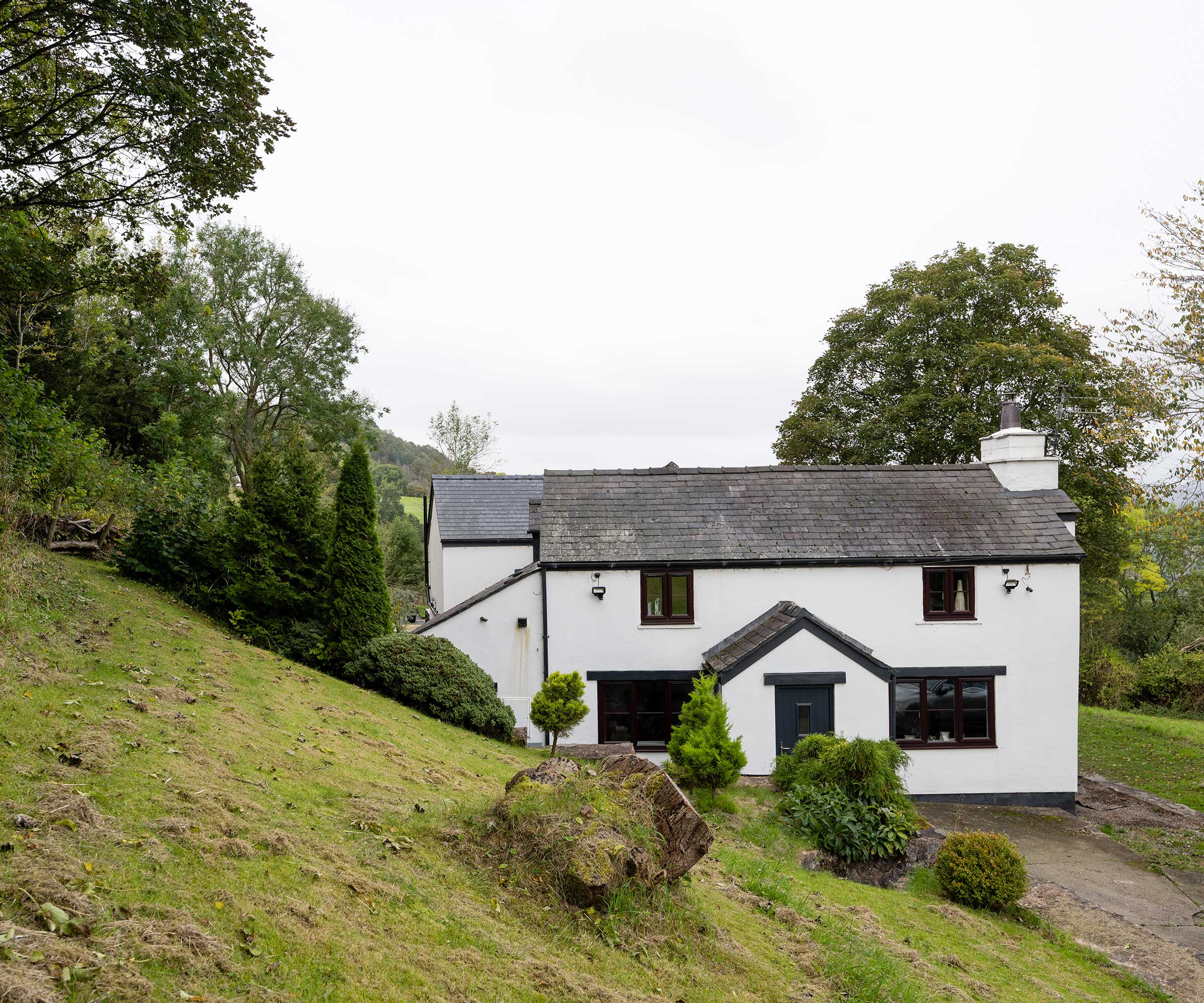 exterior of a traditional stone cottage