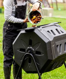 Filling a compost tumbler