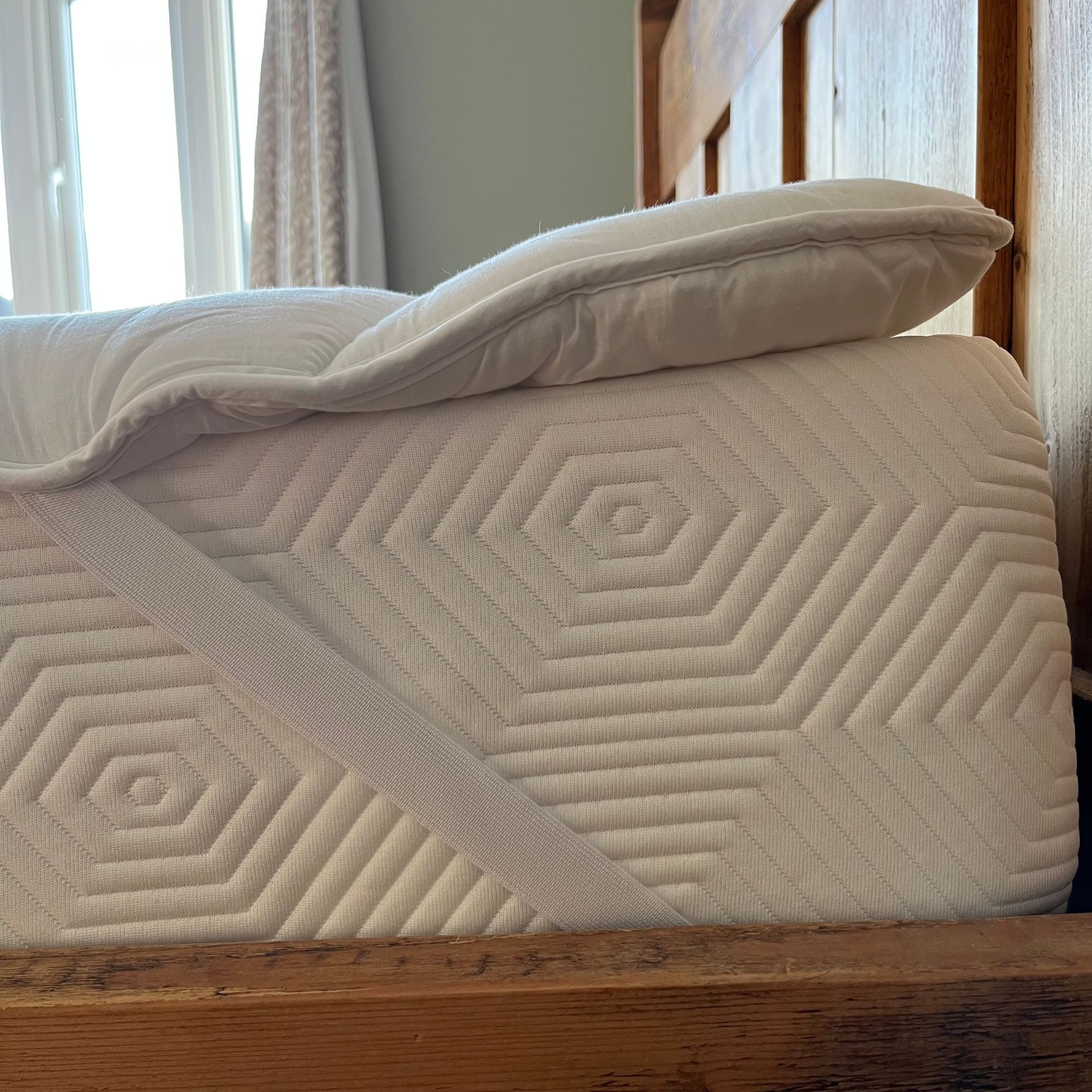 M&amp;amp;S Comfortably Cool Mattress Topper from the side with straps