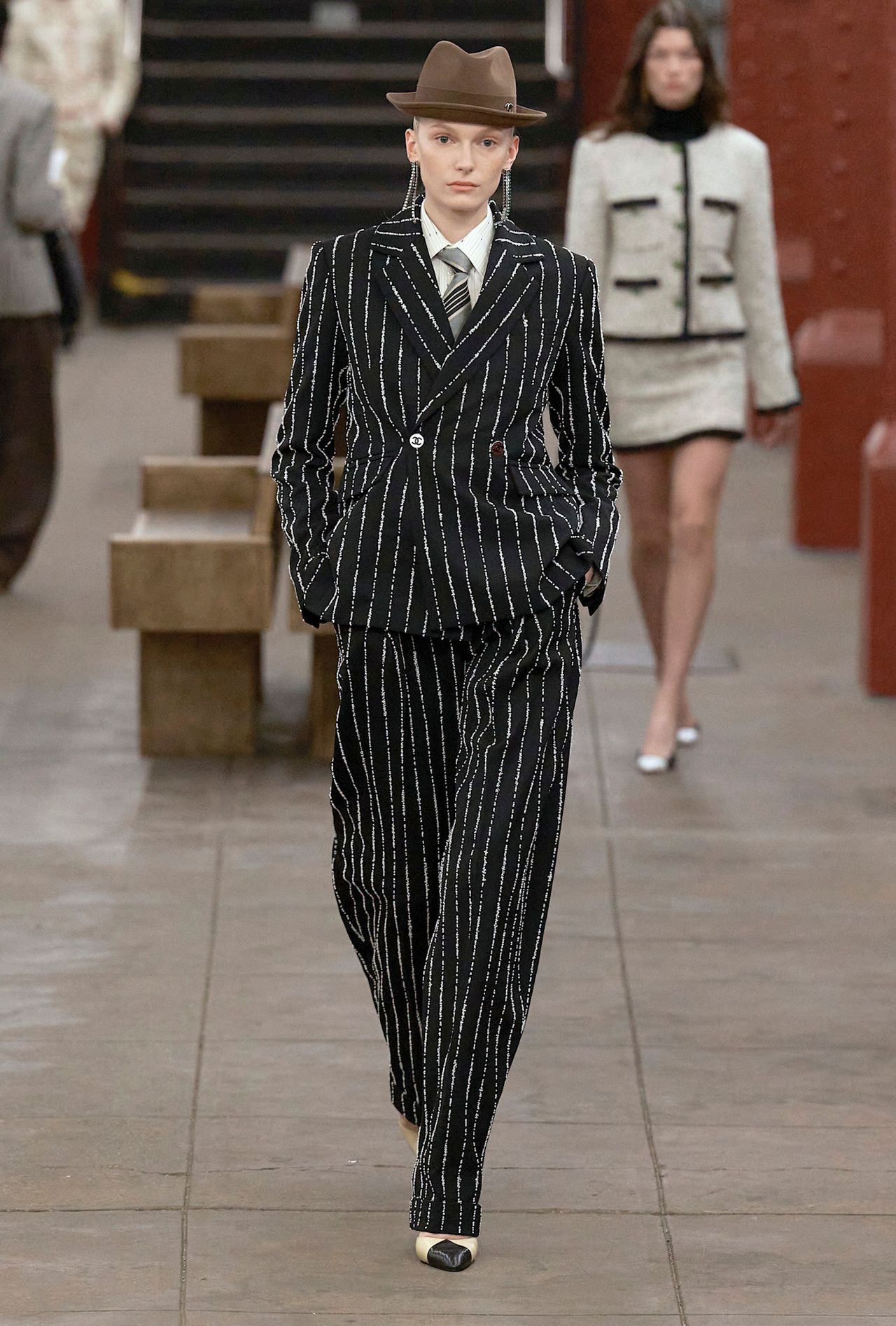 models walk the subway runway for the chanel metiers d'art 2026 show in new york city