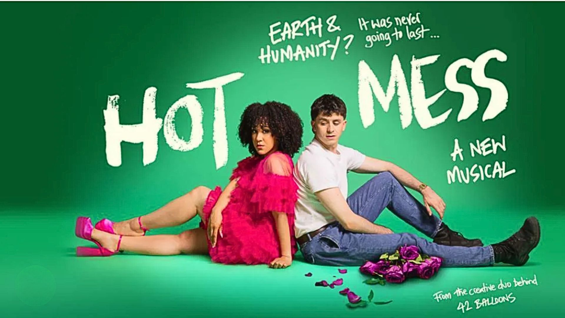 an image of the poster for the show which shows the two main actors back to back with roses on the floor in front of them