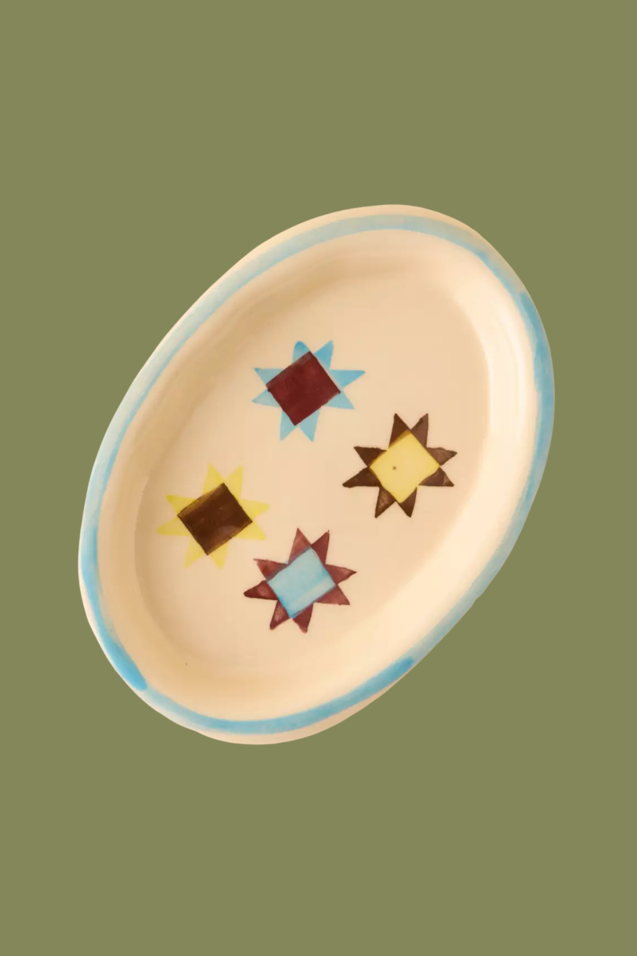 A hand painted ceramic trinket dish