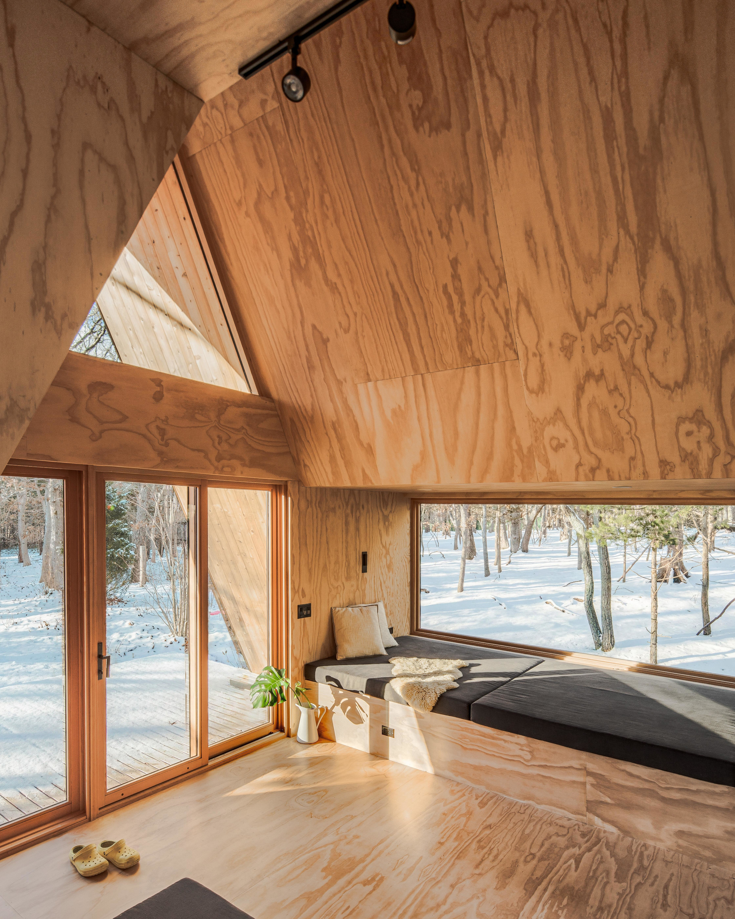 The interior provides a warm contrast to the exterior forms
