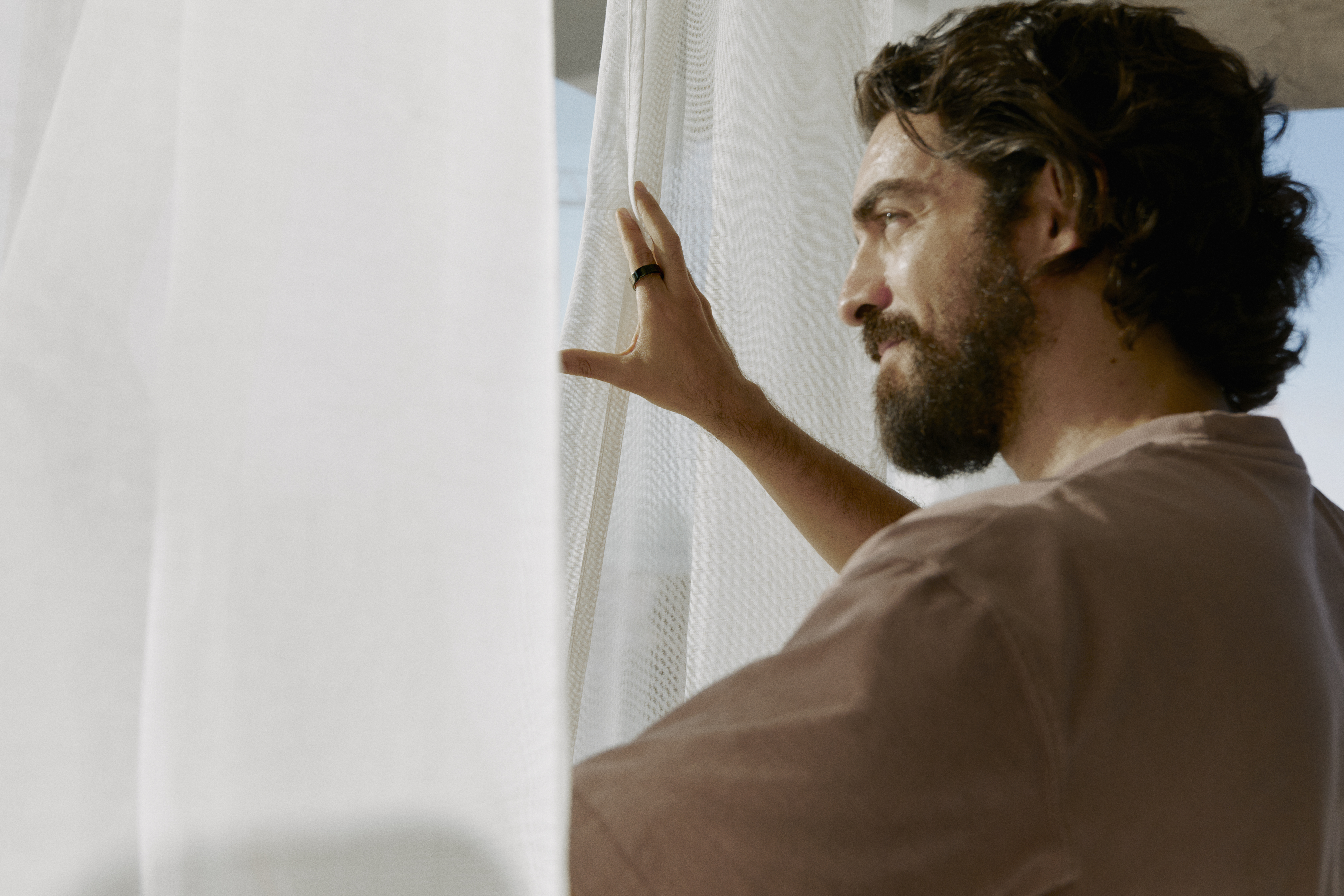 Oura Ring lifestyle image - person wearing the Oura Ring