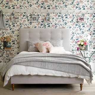 bedroom with plumbago wallpaper and poppy king size bedstead