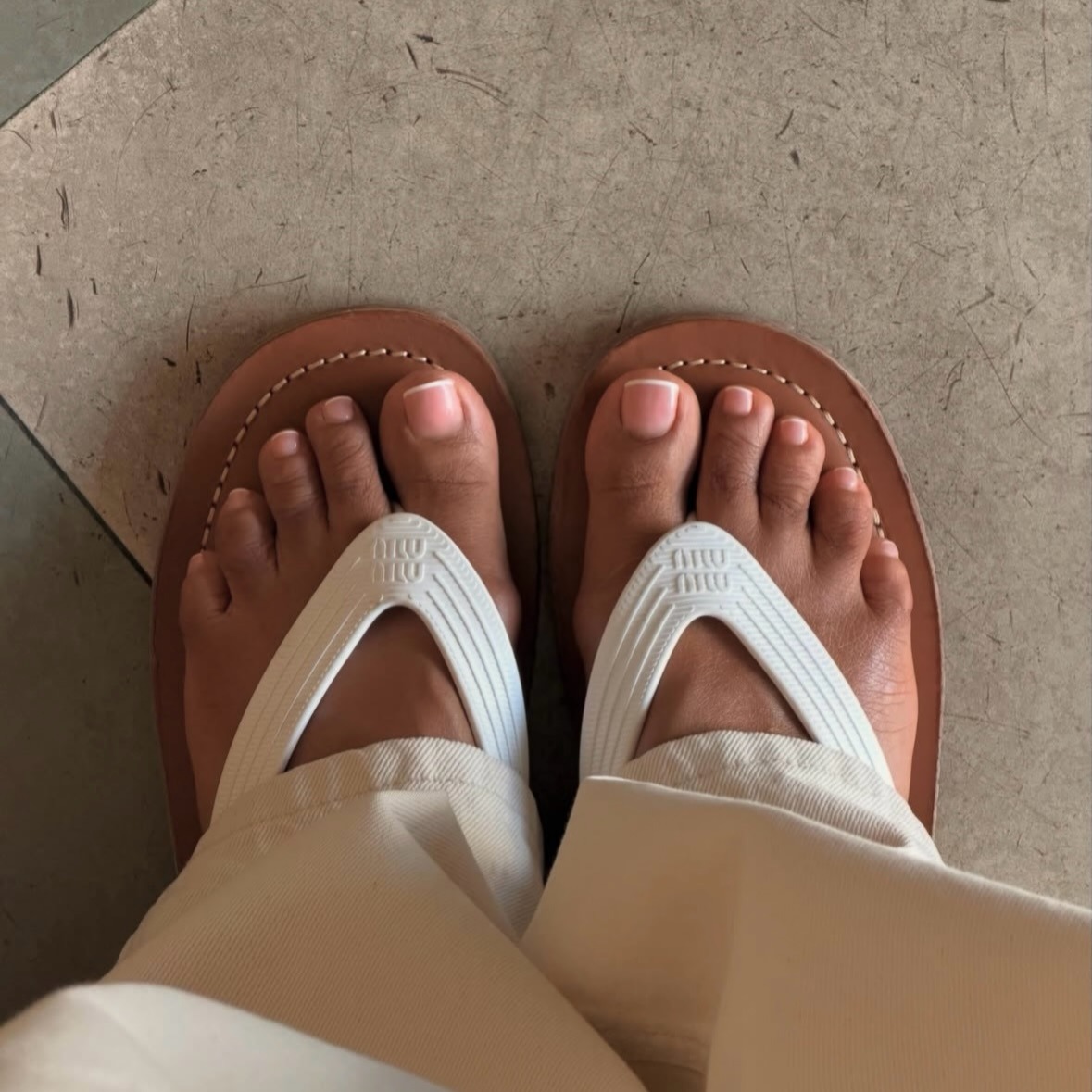 A peachy pink French pedicure