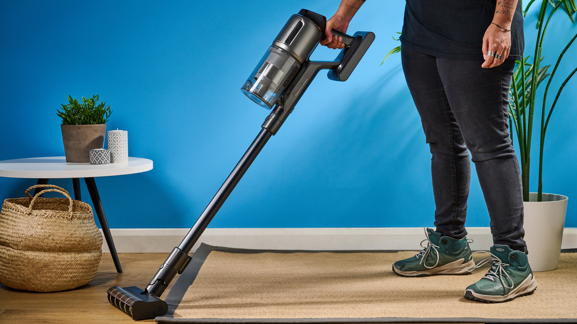 The Dreame Z30 in hand being used to vacuum