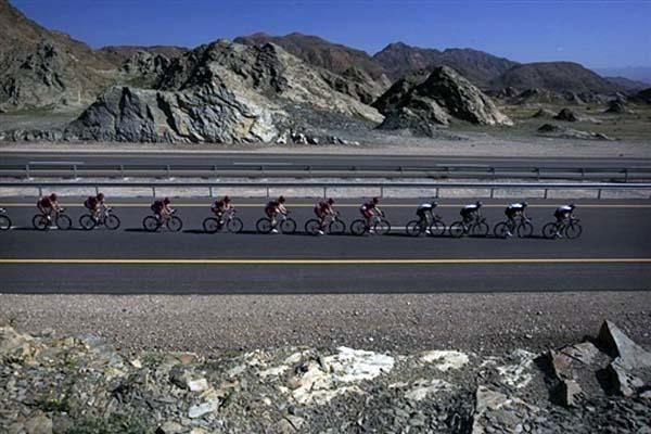 The peloton all strung out during stage three.